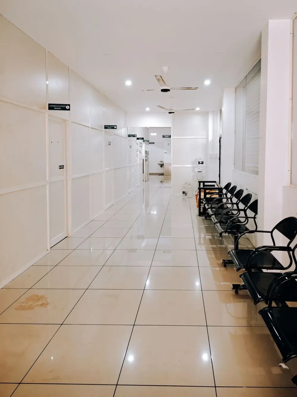 A modern hospital corridor with seating
