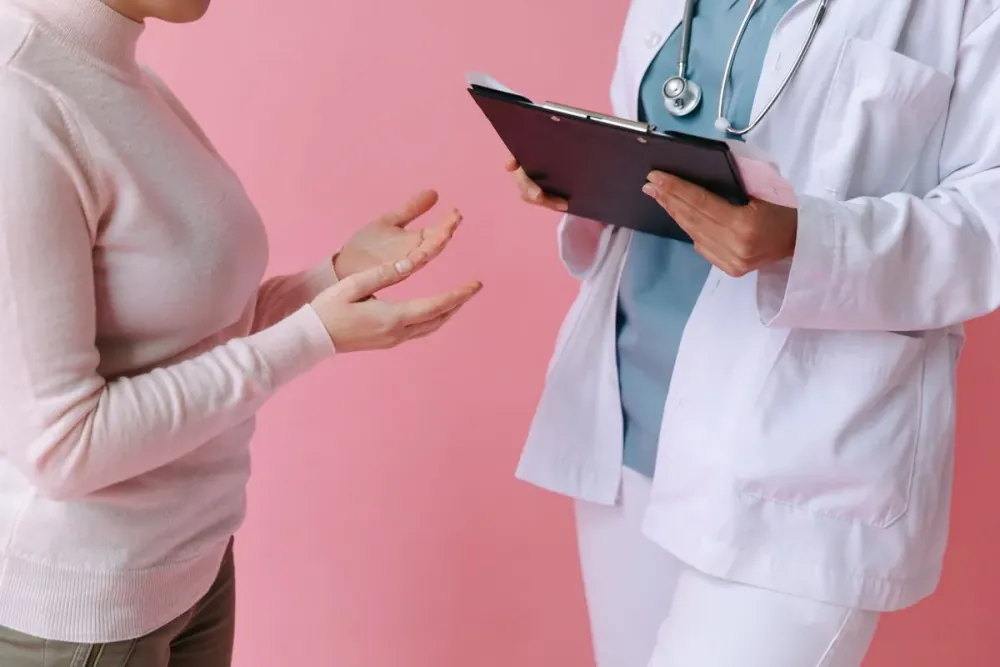 A doctor consulting with a patient