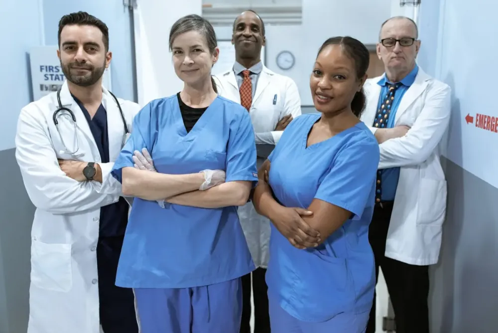 A group of doctors and nurses standing together