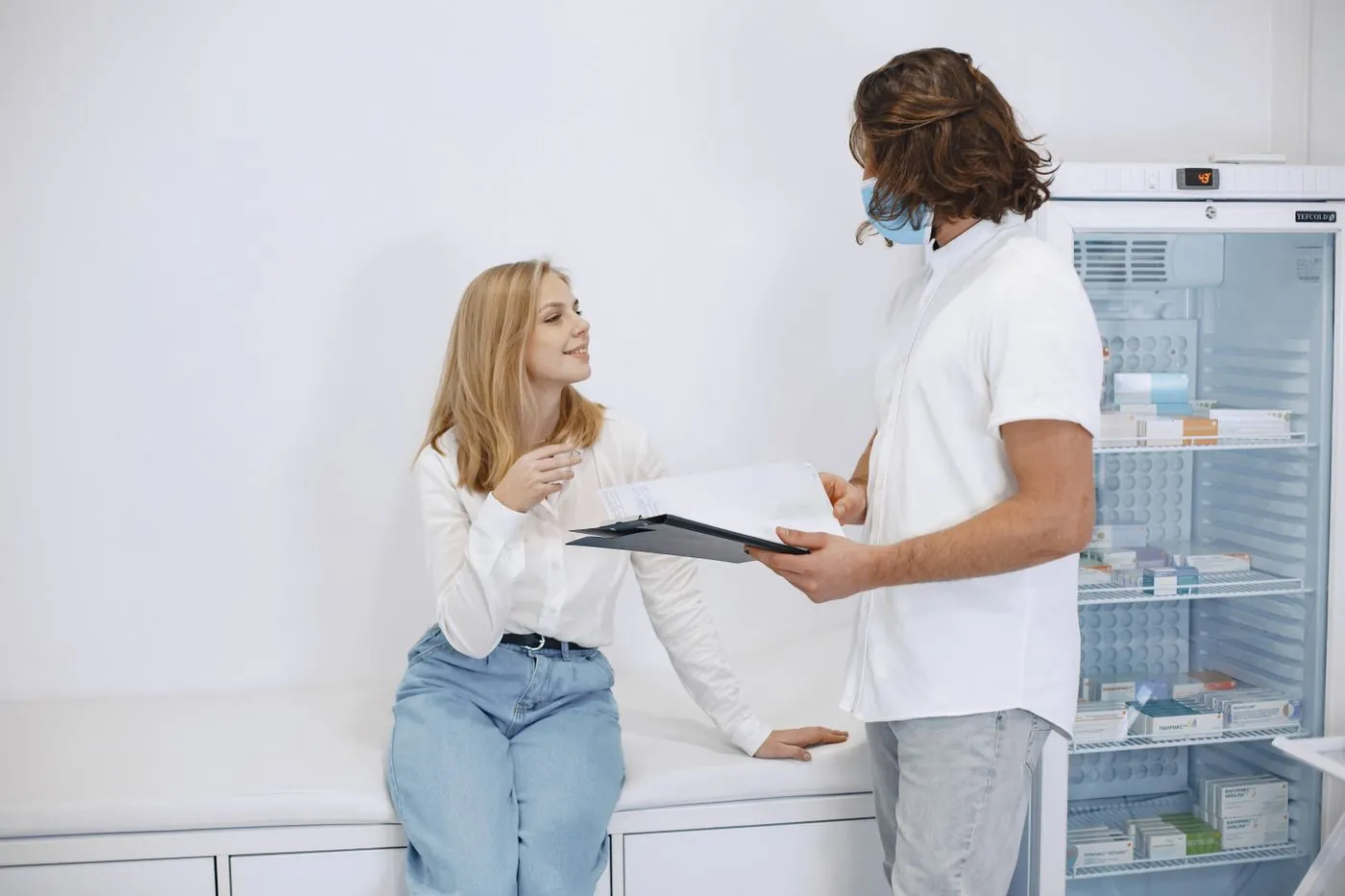 A doctor consulting with a patient